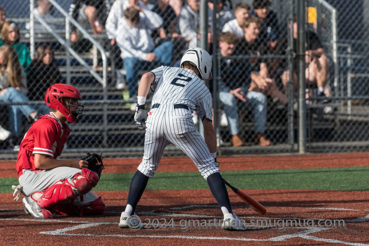 Berkley Reents steps up to the plate in a playoff win over North Eugene last year. Reents hopes to help this Wilsonville offense heat up over the next couple weeks. Photo provided by Greg Artman. 