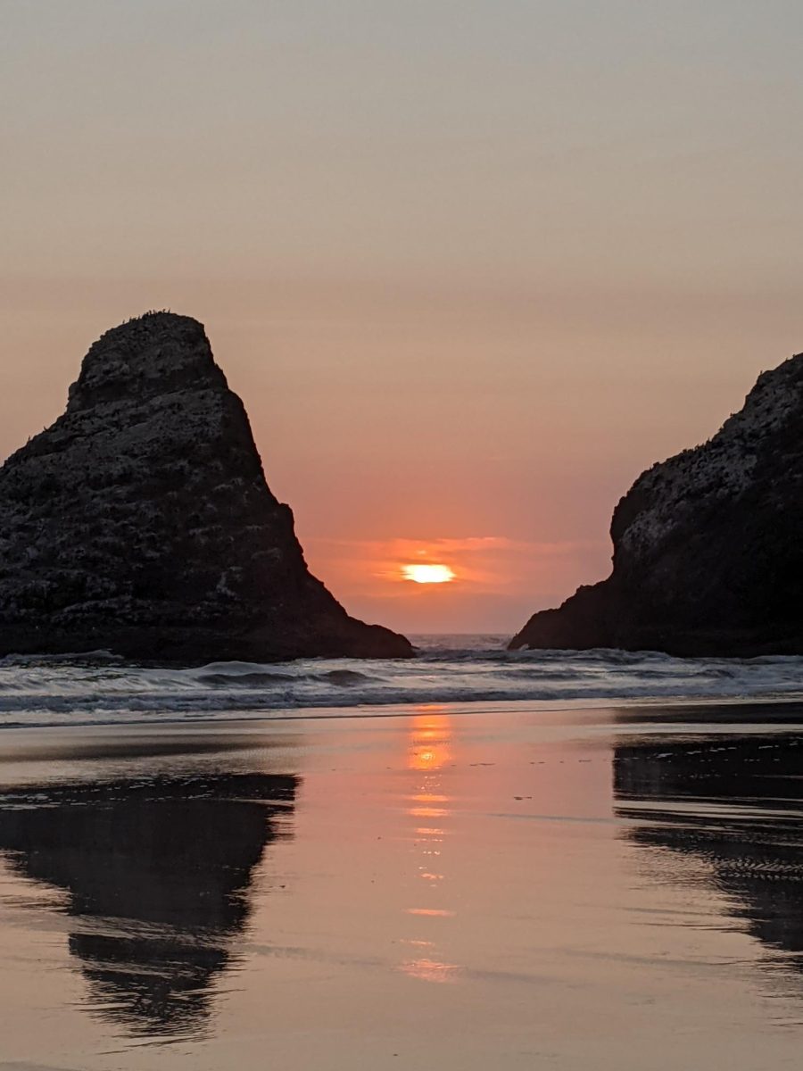 The Oregon Coast, where seniors spent the day instead of school. The sunset portrays the end of seniors' high school career, but highlights the frustrations that teachers have with increased absences.