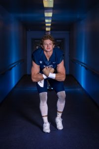 Senior Mark Wiepert is the starting quarterback for Wilsonville's varsity football team this year. His success and passion for football comes from his strong faith in Christ. Photo provided by Triple M Photography