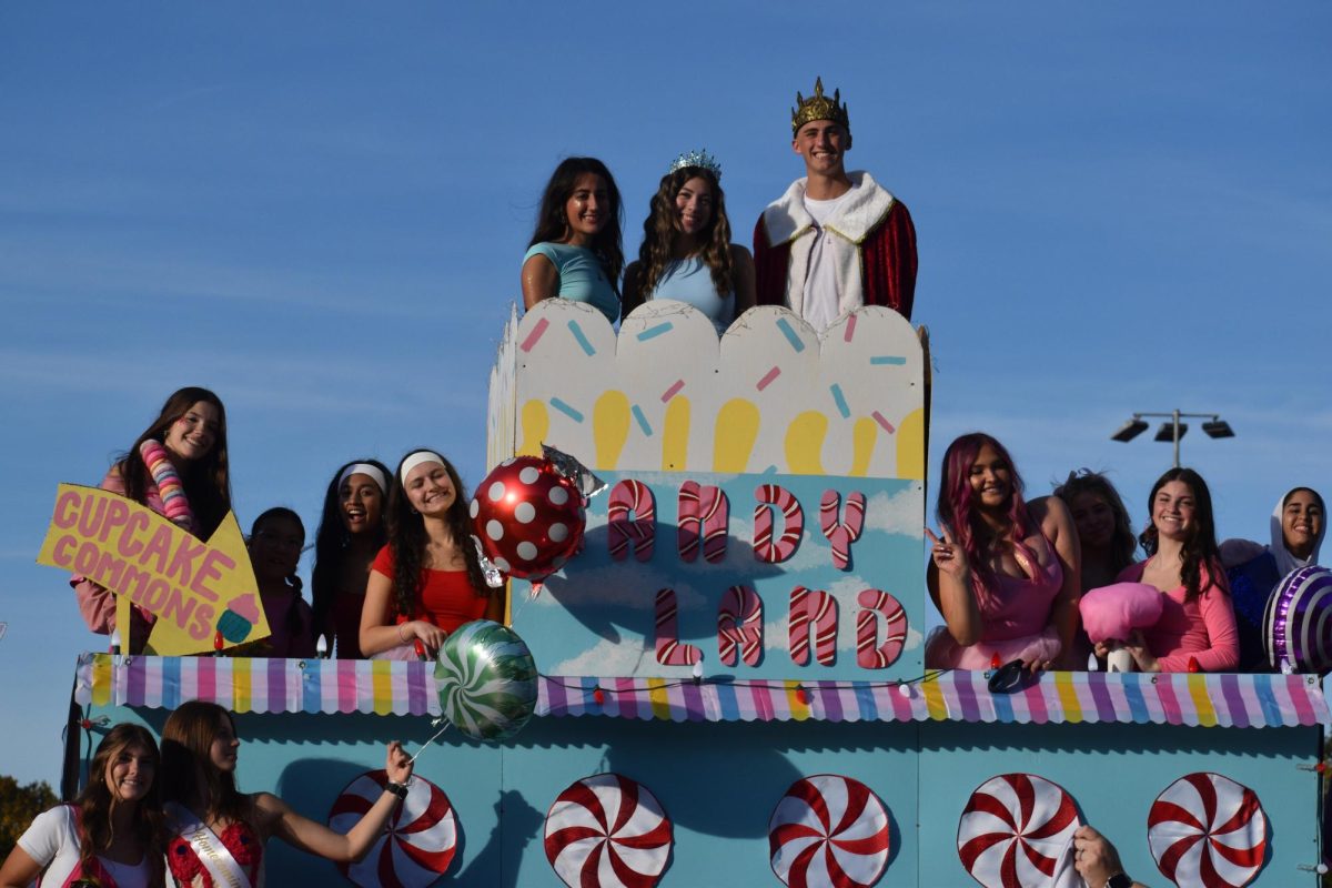 The senior homecoming float glides along the streets of Wilsonville. Much time and effort goes into the Homecoming parade, and plays a role among Wilsonville's longstanding traditions.