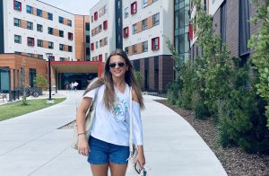 Charlotte Parry awaits her first day at University of Utah. Standing outside her new home, going full speed into the swing of adult life. 