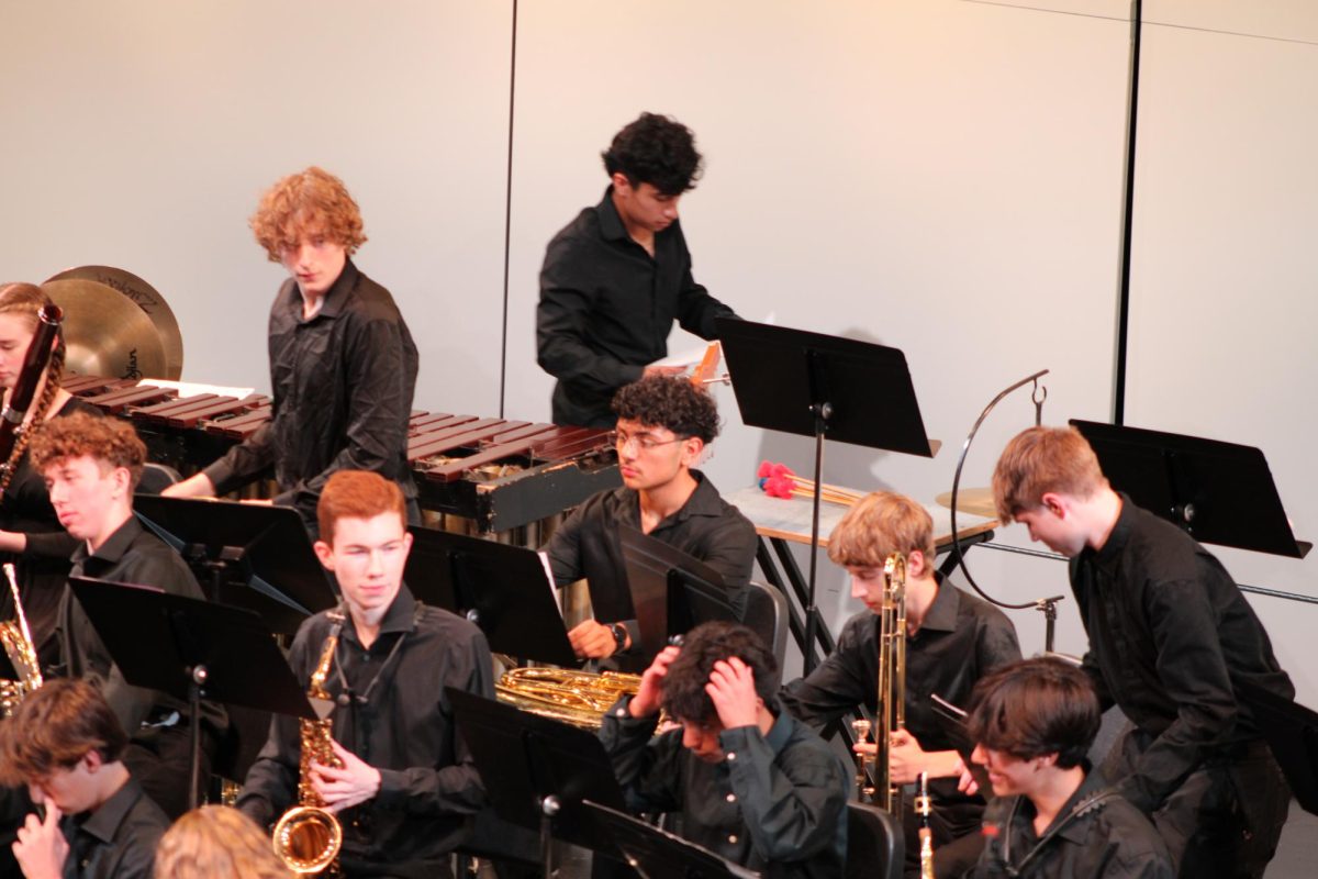 After wrapping up a piece, musicians collect themselves and the things around them to prepare for the next song. Each instrument requires a different preparation.