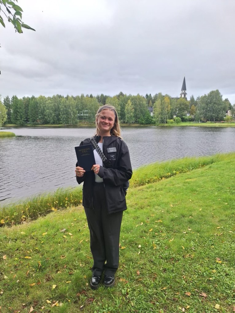 Alexis Mcllmoil, now known as Sister Mcllmoil, poses with her scriptures, The Book of Mormon, in Rovaniemi, Finland. 