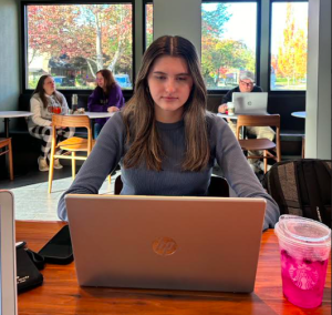 Junior Hannah Beckley enrolled in the pre-calculus course before its change to an AP class. Currently, she participates in Calculus AB with Mr. Barkley. Here, she's pictured after interview with Sofia Kerner at Starbucks, studying hard!