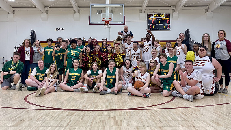 Rex Putnam and Milwaukie high school's unified teams come together for a photo after there game. Wilsonville hosts an annual unified basketball tournament every march.