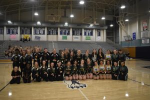 Outstanding dance team seniors from various schools receive roses to recognize their accomplishments in the sport. All six dance teams had seniors receive this recognition.