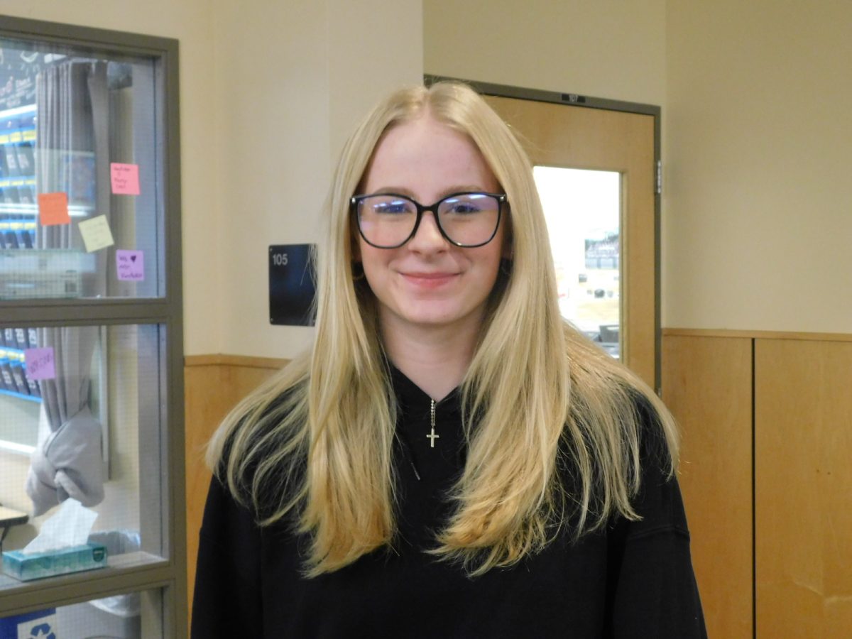 Mandy Russell is pictured in the halls of Wilsonville High School. Russell is passionate about volleyball and softball, which she plays throughout the year.