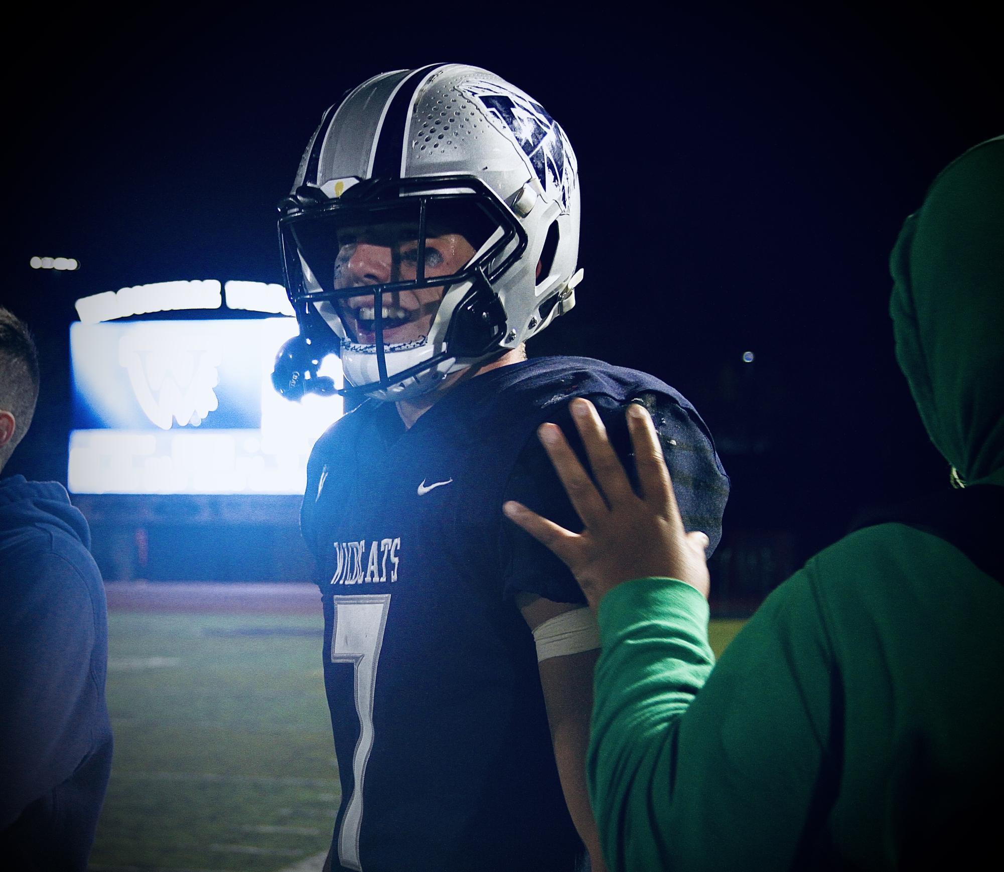 Senior, Carter Christiansen comes from the field with full smiles. Leading his team with energy and IQ, Christiansen also receives many accolades of appreciation from his teammates and coaches. 