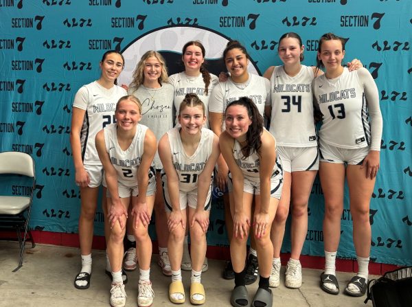 The Wilsonville Girls Basketball team playing together over the summer. The summer gives the team the opportunity to bond together on and off the court. 