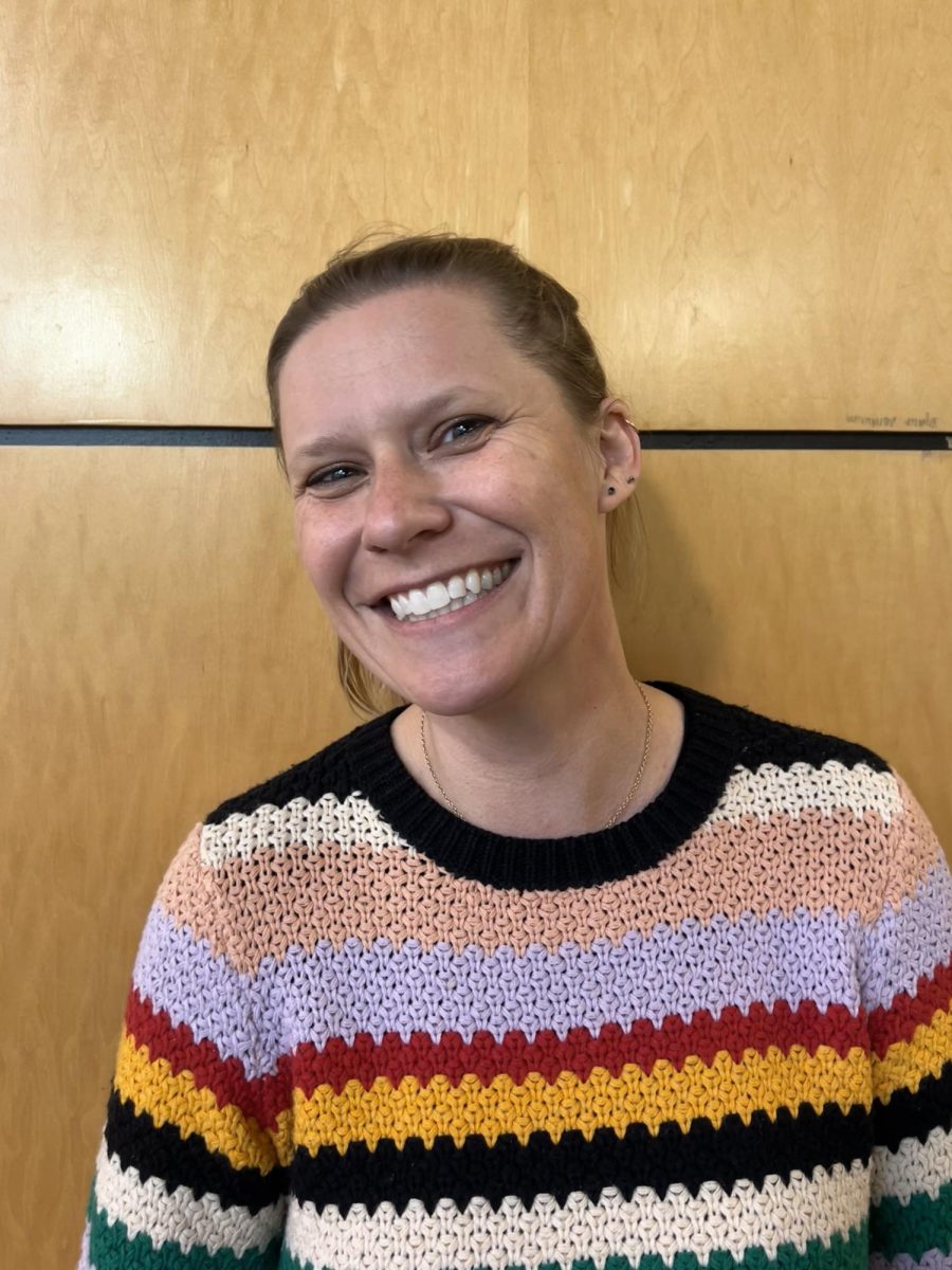 Mrs Kenzie, one of Wilsonville High School's beloved teachers, shows off her ever welcoming smile. Mrs Kenzie teaches a new "Wellness, Mind, and Body" class when she isn't teaching English.