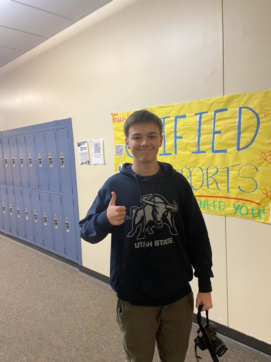 Wilsonville student Simon Bonfiglio is pictured in the school hallway. as a multisport athelte and club co-president, Bonfiglio is a believer in capitalizing on opportunities that arise.