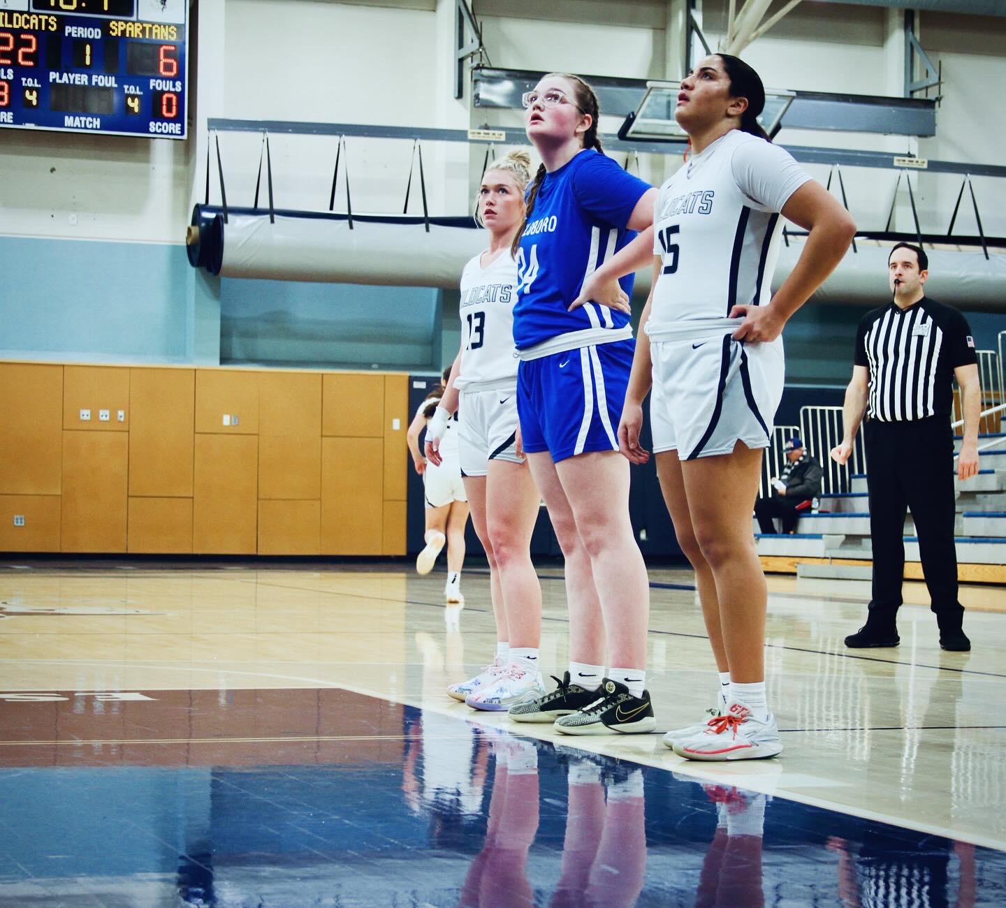 Junior Fareeda ElManhawy and Kaia Hix straddle a Hillsboro player at the free throw line. ElManhawy brings an intimidating presence on the court as a starting post, along with Payton Ratcliffe. Although ElManhawy seems strong and intense though, she's beloved by her teammates and coaches for her encouraging attitude during practice and hustle in games. 