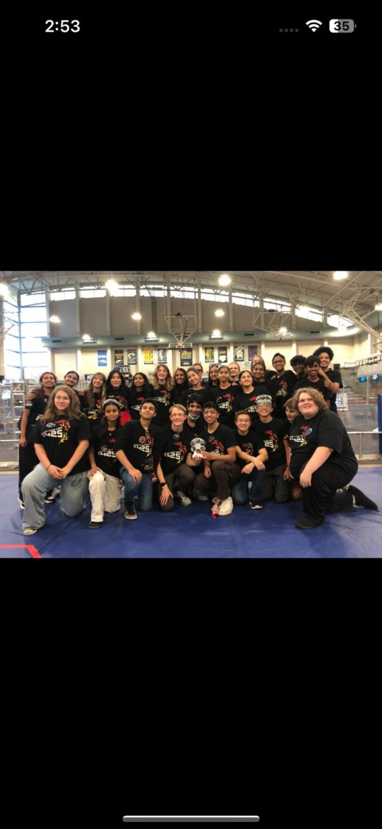 The Wilsonville robotics team gathers for a photo. The team is a diverse group that helps bring new ideas to life. 