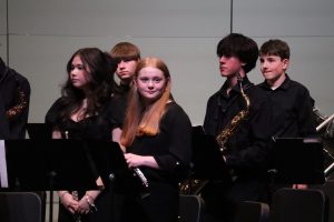 The spring band concert wraps up as a huge success, ending with a spectacular performance from the symphonic band. Gracelyn Julison looks to the crowd searching for family and friends. 