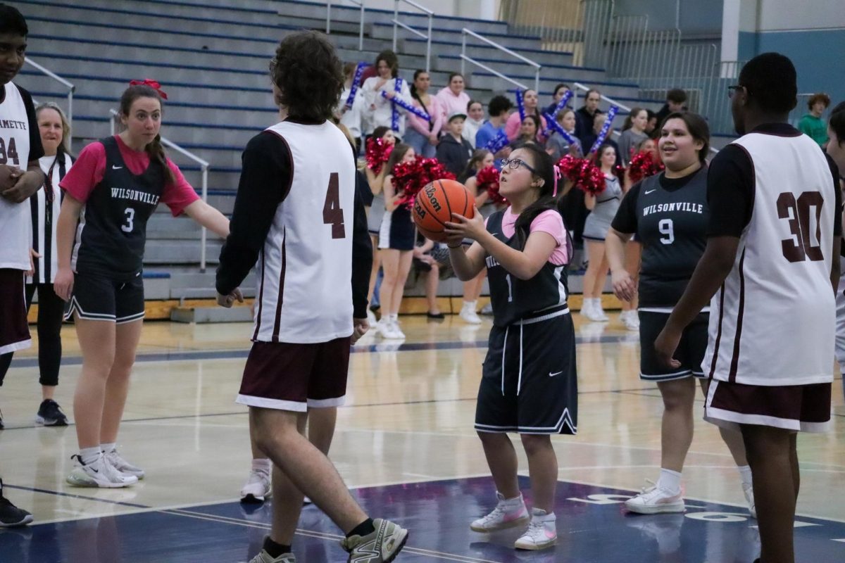 Reagan Meister sets herself up in front of the hoop for a shot. Often times, Meister leads the Wildcats in points, averaging around 10-15 points a game. 