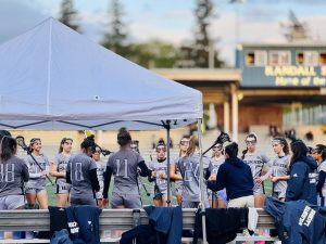 Wilsonville Girls Lacrosse shows it's team spirit though chemistry and playing aggressive together as a team. Wilsonville Girls Lacrosse shows the growth of the game in America.