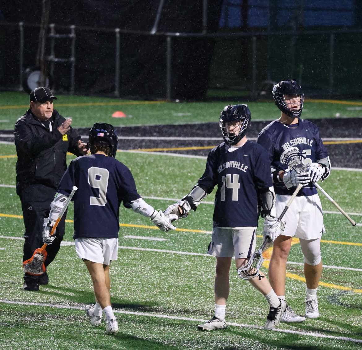 Hanson gives a low-five to Junior Midfielder Ethan Kenney. Hanson's top game this season came against Thurston, where Hanson would score five times. 