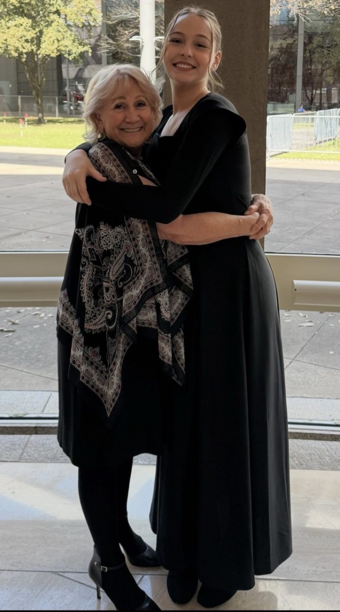 After a wonderful performance Cederberg embraces Grandma Carrie with whimsy in her heart. Being able to have both her parents accompany her on the trip made it all the more memorable. 