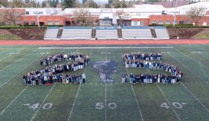 The Class of 2025 takes to Randall Stadium in the shape of a 25. Their dedication to excellence at Wilsonville High School leaves behind a strong legacy for future Wildcats. Photo provided by WVHS Yearbook.