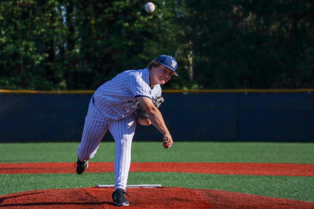 Junior pitcher Colby Kosderka throws out a pitch early into his start. Kosderka's a first year varsity player who's been on a heater from the bump.