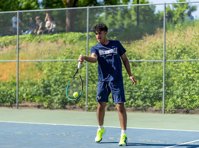 Senior leader Aria Azii Dueling on senior night portraying the skill and growth of the fun compelling game of tennis. Wilsonvillle boys tennis has improved meet by meet this season.