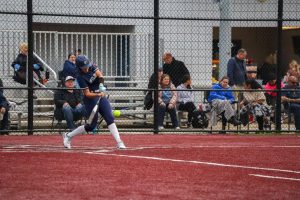 Sophomore Shae Seber in action during her at-bat against Silverton. Seber works hard to have the best outcome she can while hitting at the plate. 