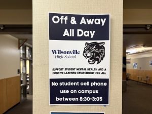 Image showing one of the many poster displayed throughout the school reminding students that the phone policy follows them outside the classroom. The poster clearing states that phones are to be off and away all day starting at 8:30 all the way till 3:05.