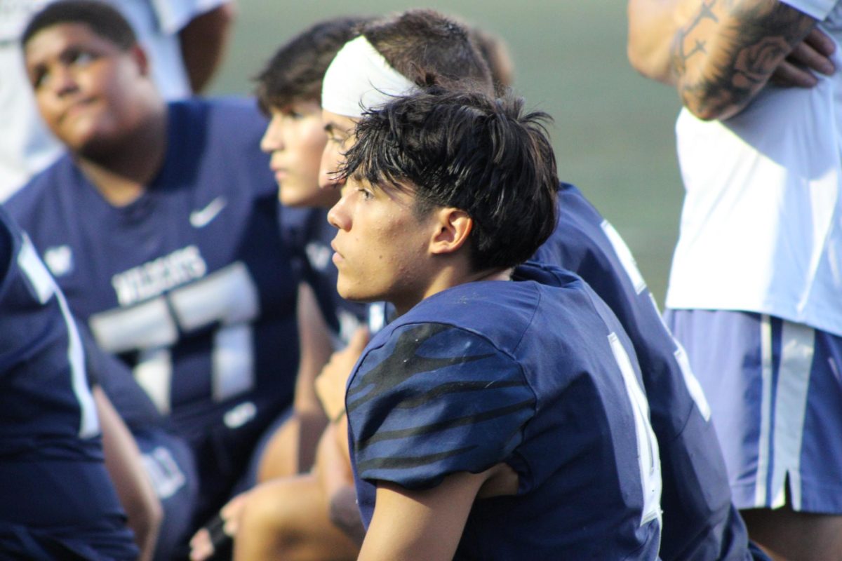Ari Reyes, along with Luke Carli, Ryder Rodriguez, and Eli Stevens come together in between plays to connect with the rest of the team. Reyes is playing a crucial role on both sides of the ball this year.
