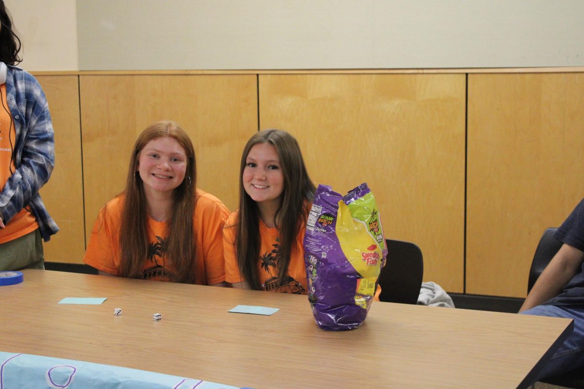 Alyssa Hurley and Mia Winters represent their club, Link Crew. Alyssa says, "our goal is to welcome the new incoming freshman and make their transition to high school easier, and more efficient."