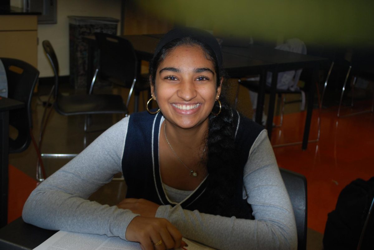 Kalavai cracks a big smile while in AP Environmental Science. She certainly lights up a room, as this photo shows. 