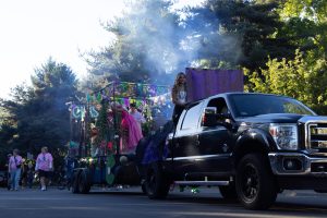 The homecoming parade, featuring the float designed by the senior class. The image was taken by Tyler Widener, one of Wilsonville's student photographers that dedicated hours to photographing the various events that took place over the homecoming weekend.