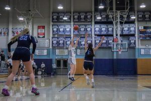 Gabi Moultrie pulls up from 3 against Corvallis High School. She would finish the game with 29 points.
