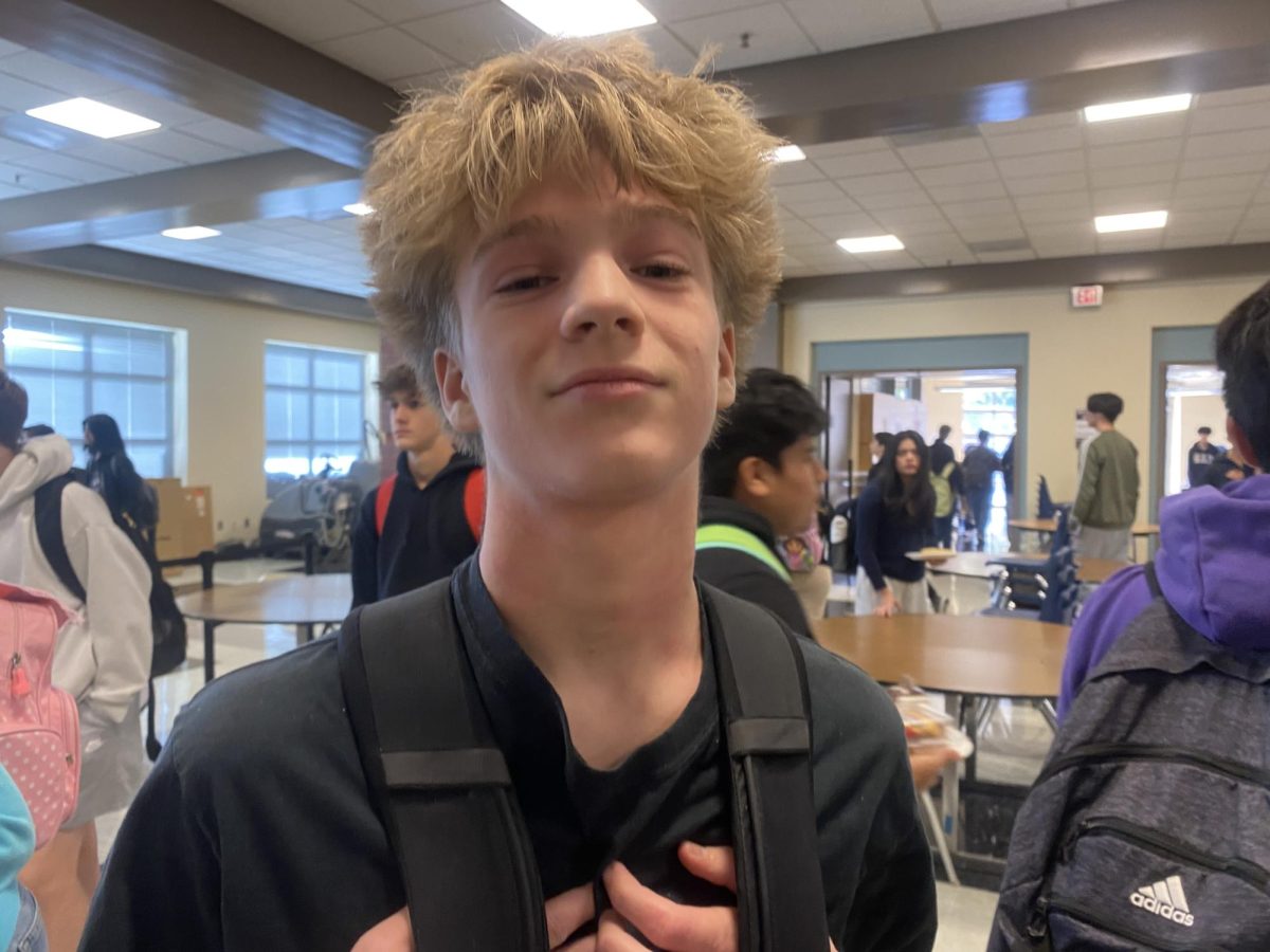 Cooper Sanders gets his picture taken during lunch time. Cooper in his free time like to snowboard and take pictures in his free time.