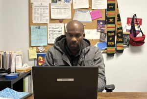 Photo of Mr. Abraham in his counseling office. Mr. Abraham is apart of the amazing counseling team at WVHS. To have a meeting with your counselor, simply go into the counseling office and sign in on the computer. 