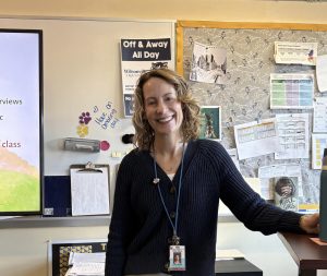 Photo of Ms. Hanlon in her classroom. Ms. Hanlon is an AP teacher and creates a learning environment that is engaging and supportive. 
