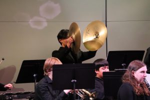 James Lee clashes the two metal symbols, "Ahhhh" the audience cries confusing it with an earthquake. The fear fades away because of Lee's beautiful playing they realize it was in fact not an earthquake.