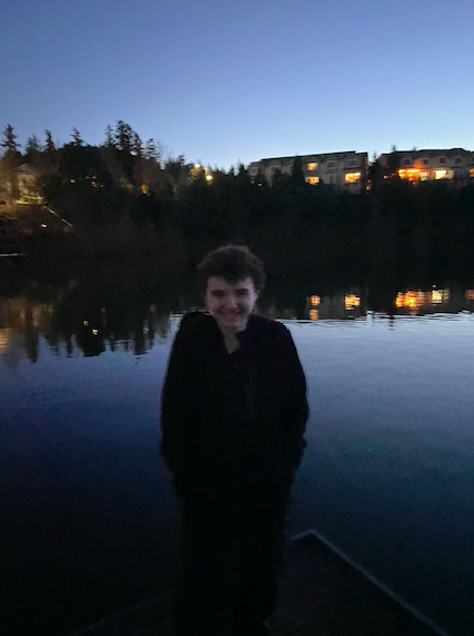 Jack Levesque, posing for the picture before winter formal freshman year. he complained as his friends made him take pictures on the dock outside La Provence. 