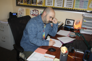 Senor Smeraglio, a versatile teacher who instructs many levels of Spanish, dreadfully sits grading student’s assignments. He admits to falling into the sticky cycle of putting mundane tasks off, voicing his likelihood to, "procrastinate grading homework.” 