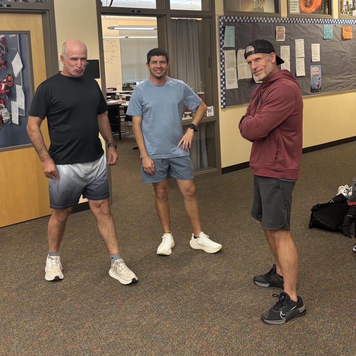 The coaches pose in between heated film discussions. Finck loves Christopher Nolan, but Barkley prefers older movies like The Goonies and Lawrence of Arabia. (Robbie Osborn)
