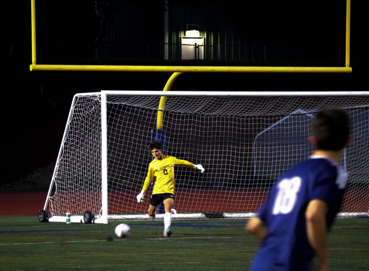 Noah Spisak attacks the ball as he swiftly goes from goal post to field. As a goalkeeper he trains himself to quick reactions and punt hard. 