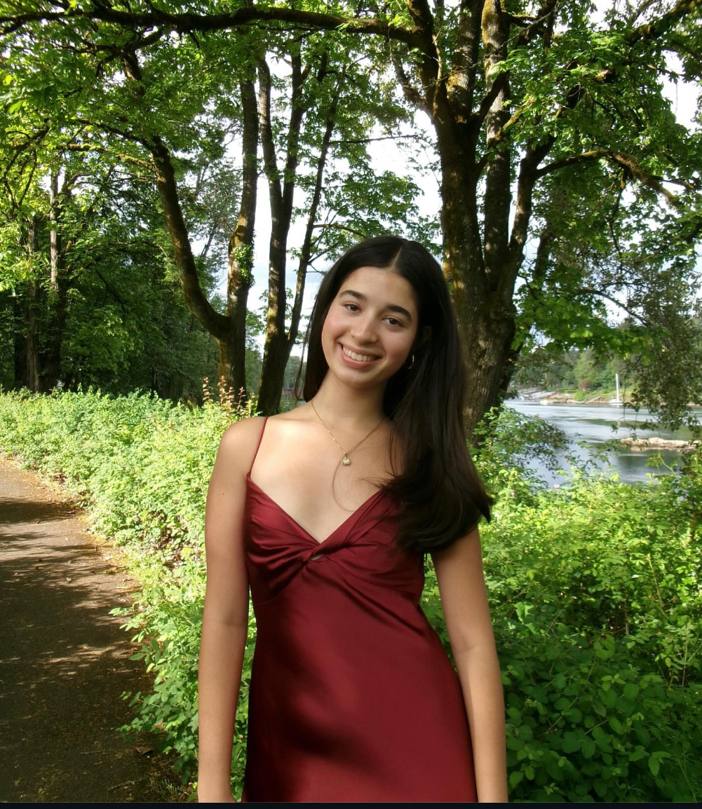 Yaamini Aga poses for a picture before her junior prom. Aga tries to be involved in any way she can.