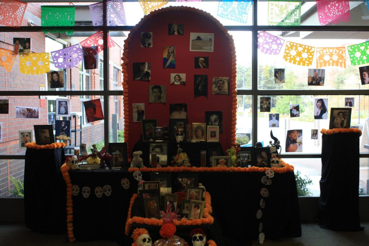 A beautiful ofrenda stands at the front of the Wilsonville High School to represent a special tradition done on Dia de Muertos in many hispanic families. Here we celebrate and bring back to life our loved ones who have passed by sharing their stories, pictures and favorite foods. It's now become hazardous to express this beloved culture and their traditions by families and communities publicly without getting targeted by ICE.