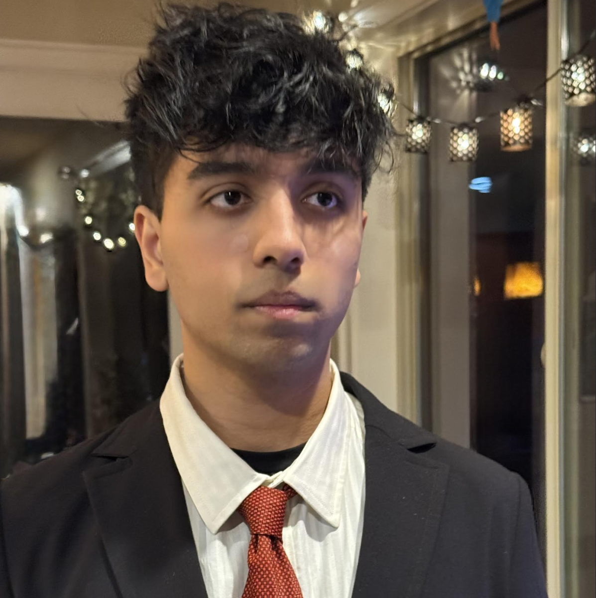 Aarush captured outside of school, dressed up for a fancy event! 