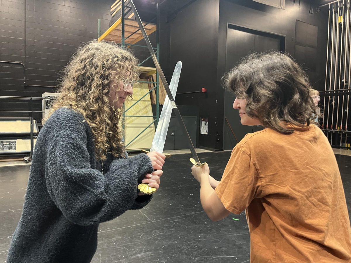 Brooke Campbell and Avery Levandowsky find themselves in a heated battle. Swords slashing at one another they find themselves in a standstill, the winner never to be known...