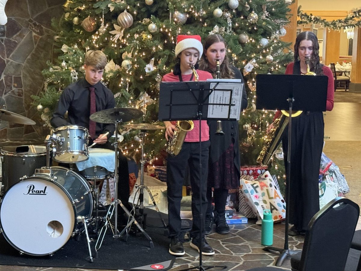 Jazz Club gathering at retirement home for seasonal performance. Here we see them preparing to give the audience a show of a lifetime. 
