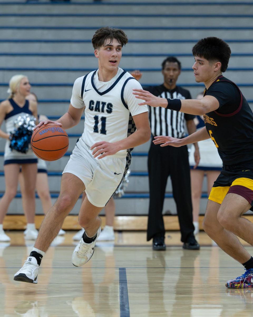 Junior guard Jett Bruce runs the offence against Putnam. Jett has stepped up this year, after the program lost important seniors.