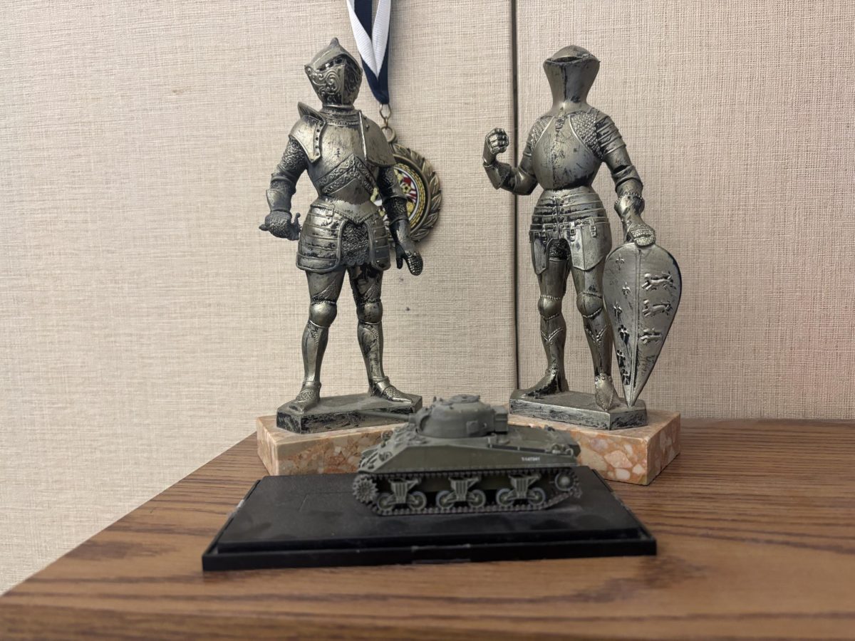 Mr. Eby's war-themed collectibles. War films can be a great way to learn about history, and are shown in many classes.