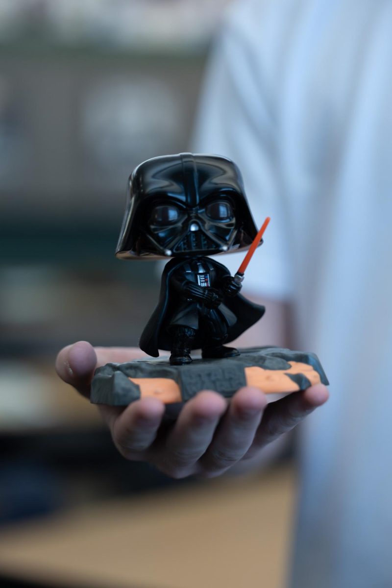 A Darth Vader figurine, fully dressed in black. A cultural icon like no other.