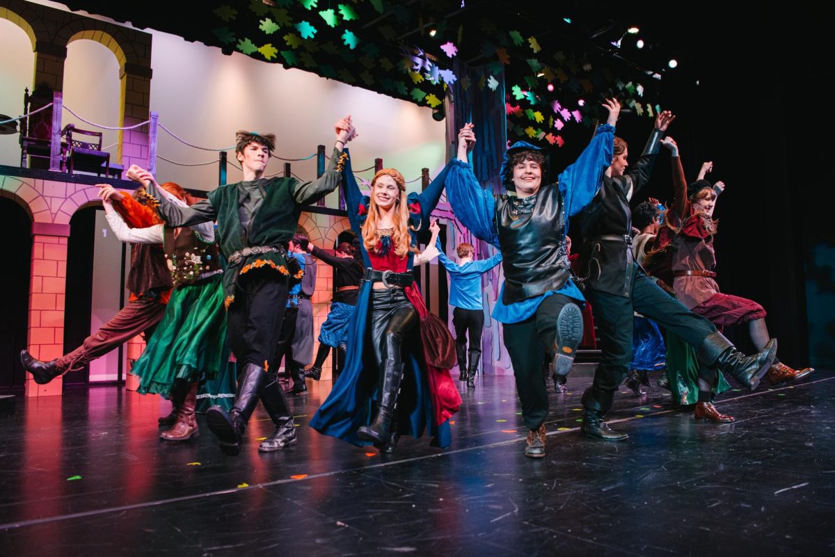 Finishing the show the cast comes together to dance in harmony. Evil vs. good, it doesn't matter anymore, not when the power of music brings everyone together!