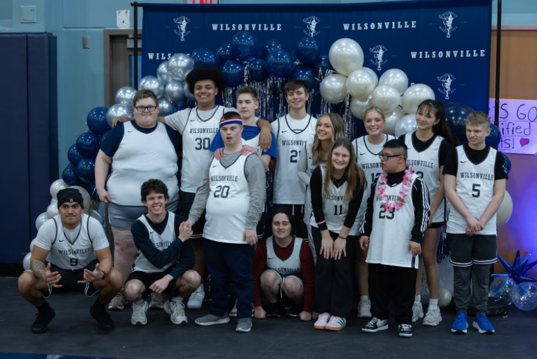 This image depicts the graduating class receiving awards during senior night. This was one of the last games the unified team played before the season came to an end.